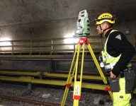 Scan Survey staff member creating fixed mark measurements in train tunnel